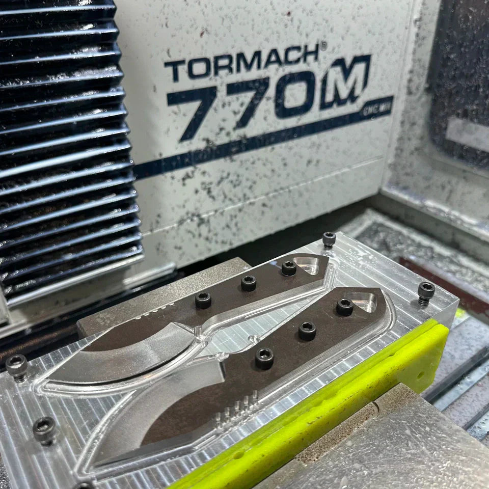 CNC-machined fixed blade tang and G-10 scale fit